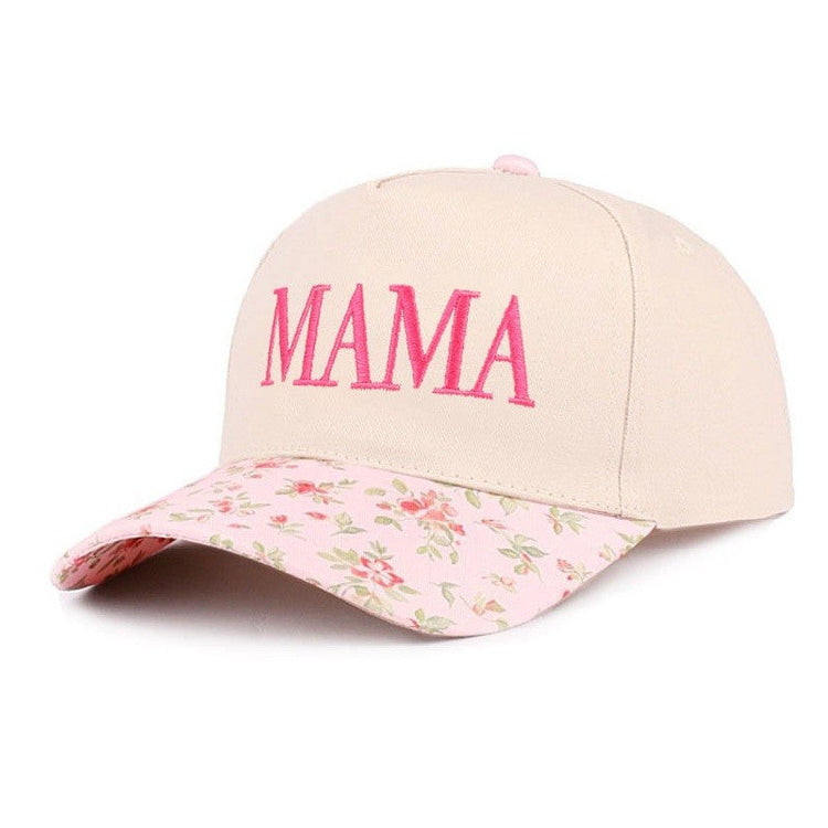 Beige cap with floral brim and pink 'MAMA' text on a white background